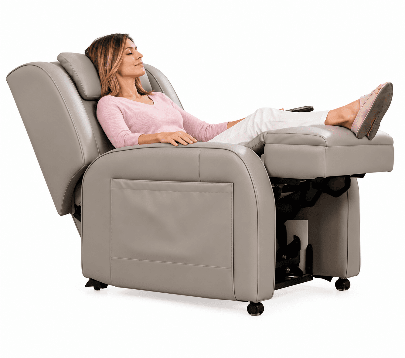 A woman relaxing in a reclined massage chair in her lounge room