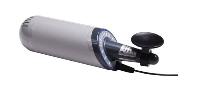 A handheld massager with a round applicator head